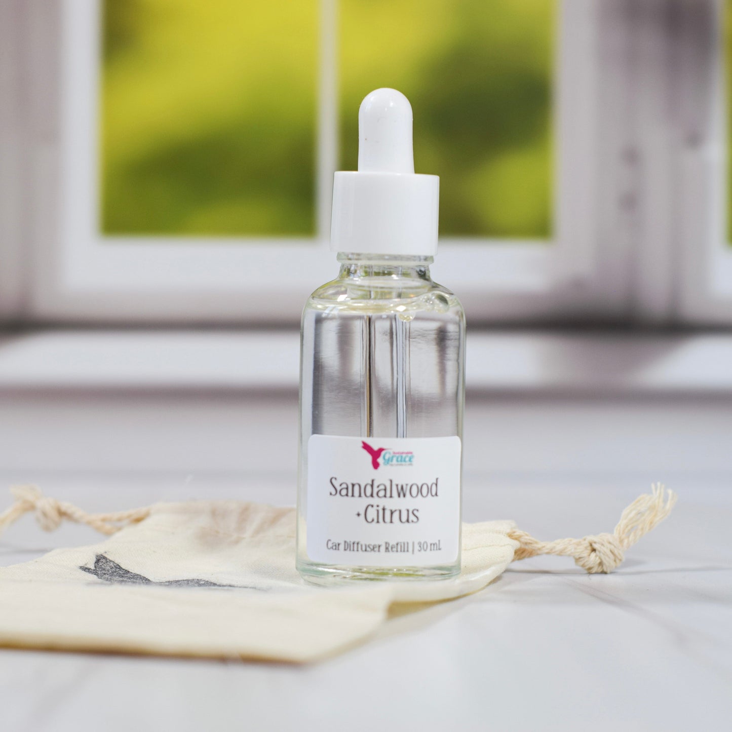 sandalwood + citrus car diffuser refill bottle