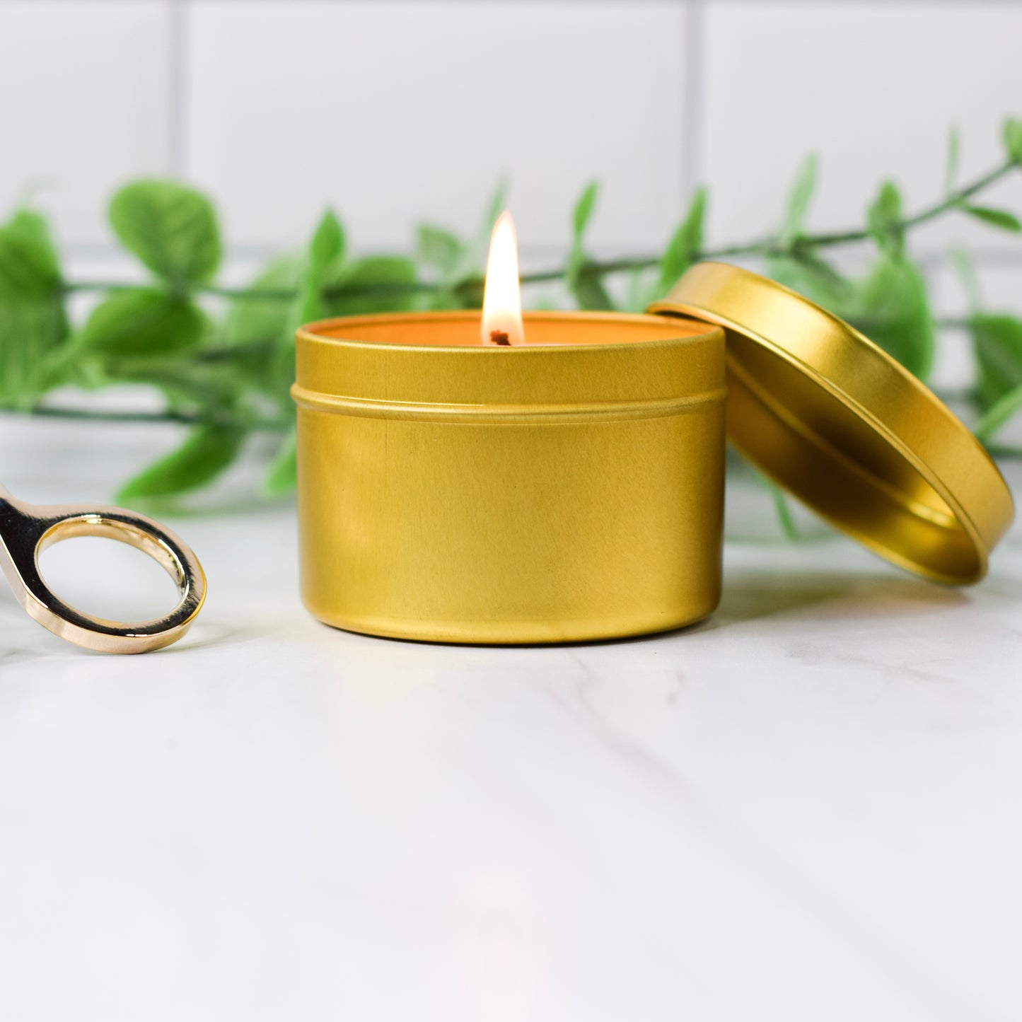 4 oz gold tin candles from sustainable Grace 