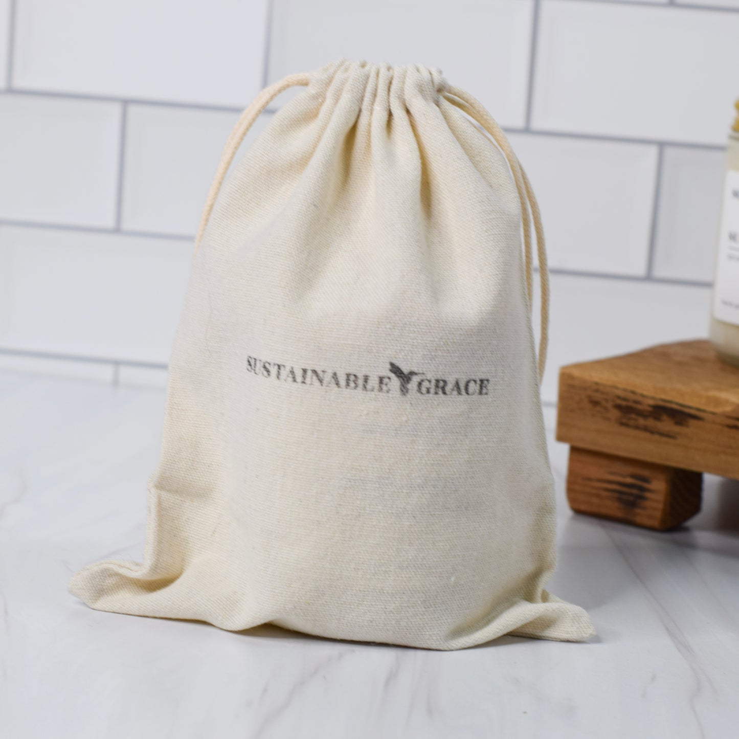 eco friendly and reusable candle gift bag from sustainable grace