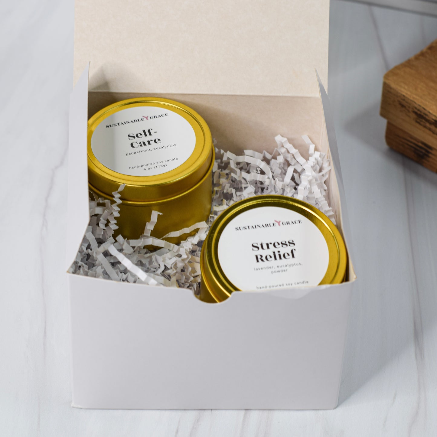 gold tin candle gift box from sustainable grace