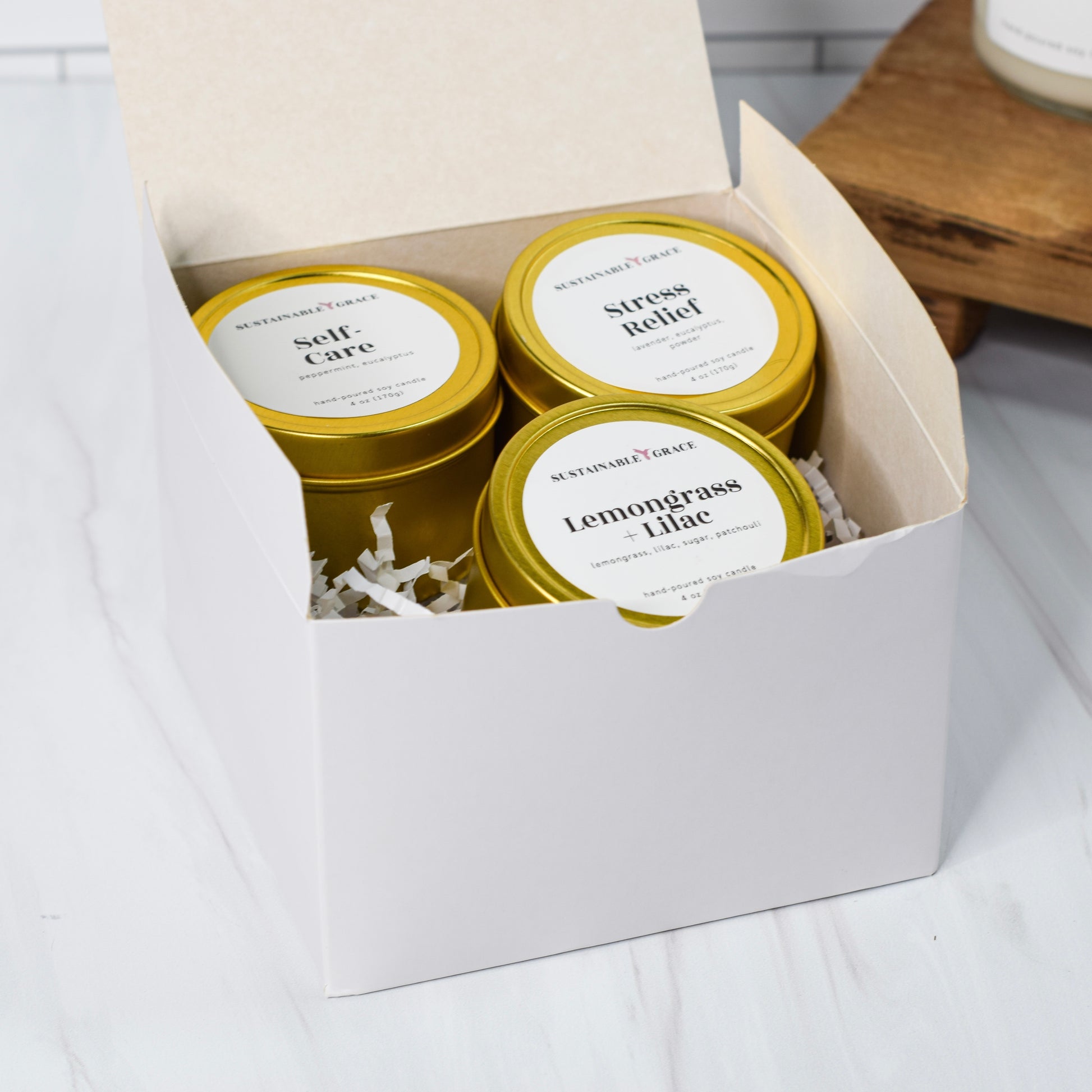 candle gift box from sustainable grace for 3 gold tin candles