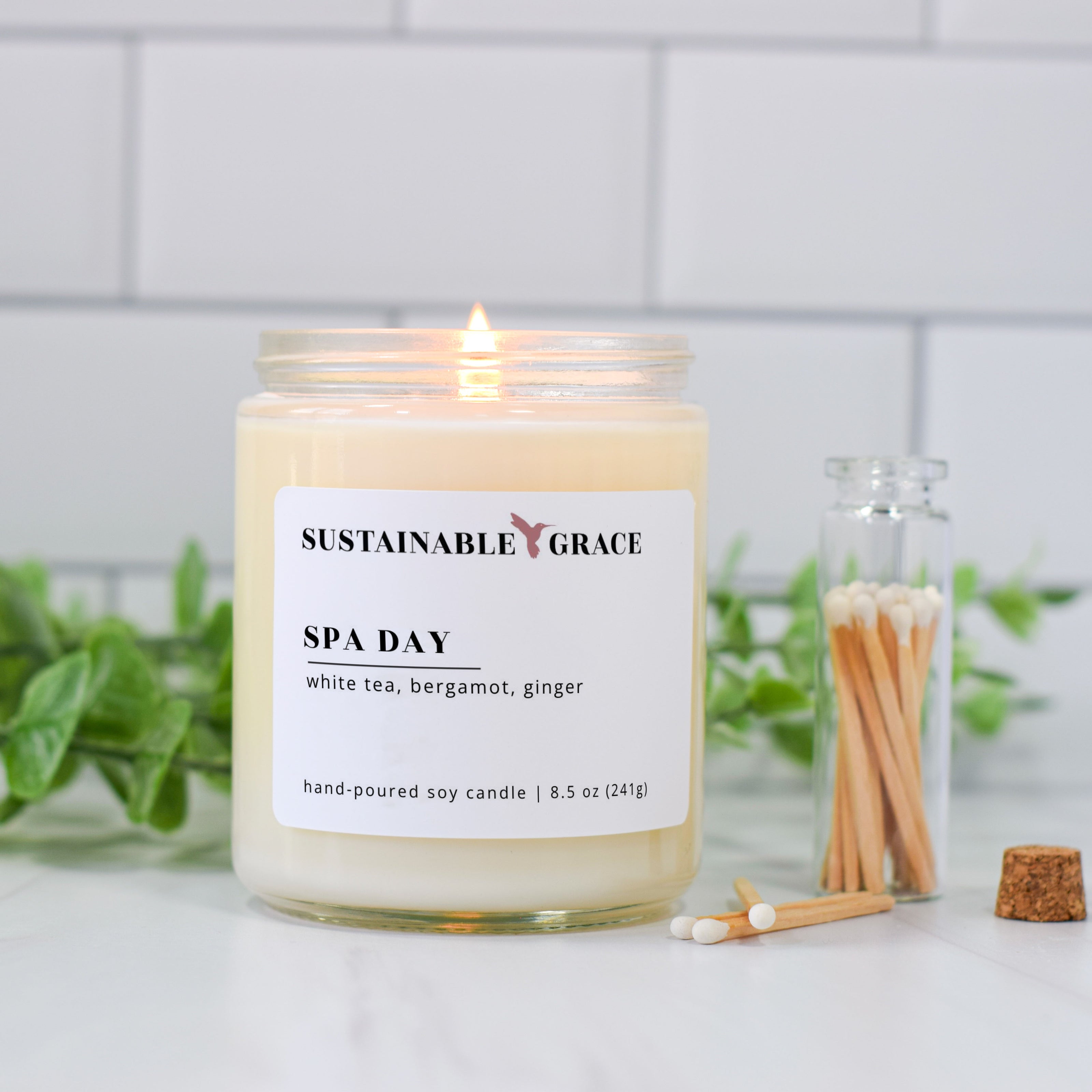 lit spa day white tea and ginger soy candle from sustainable grace 