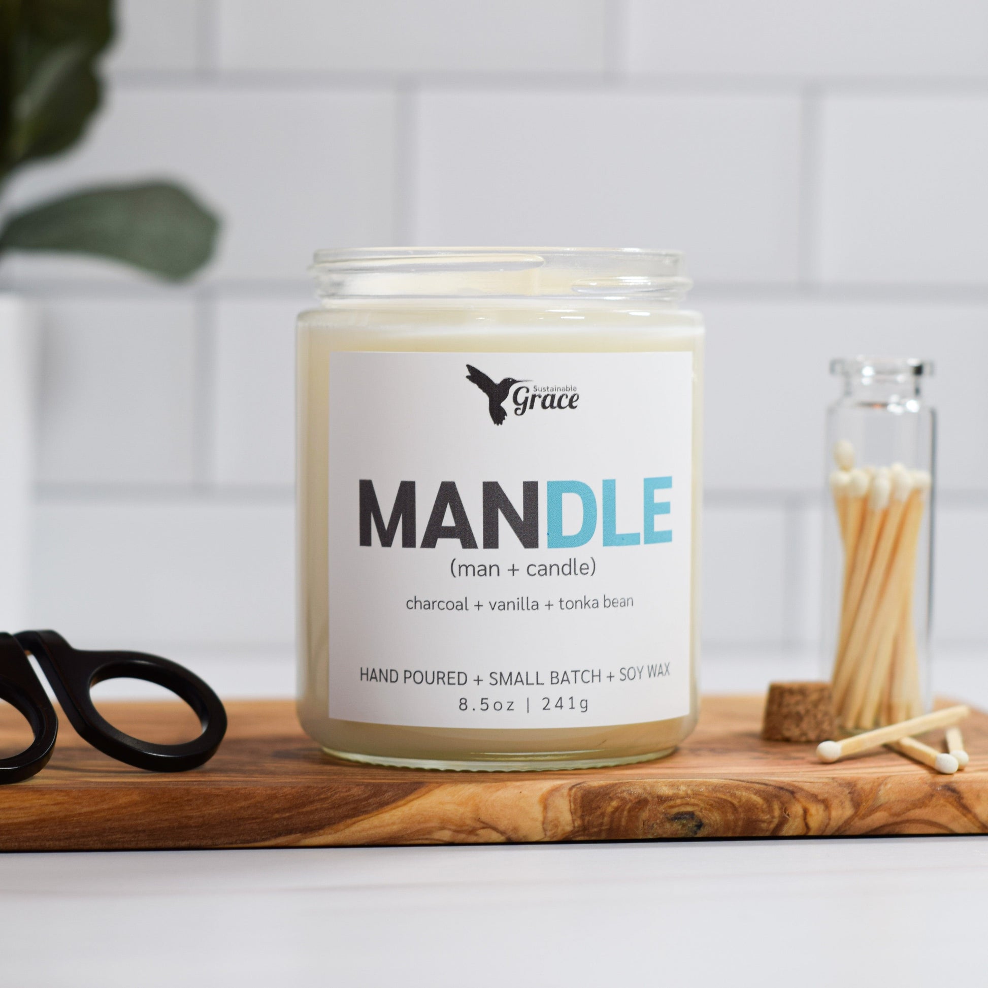 mandle man candle charcoal and vanilla soy candle 