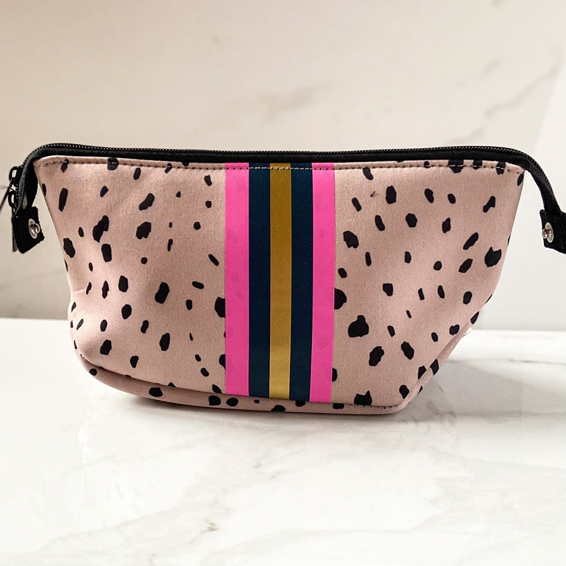 Neoprene makeup bag tan with black spots and pink and blue stripe